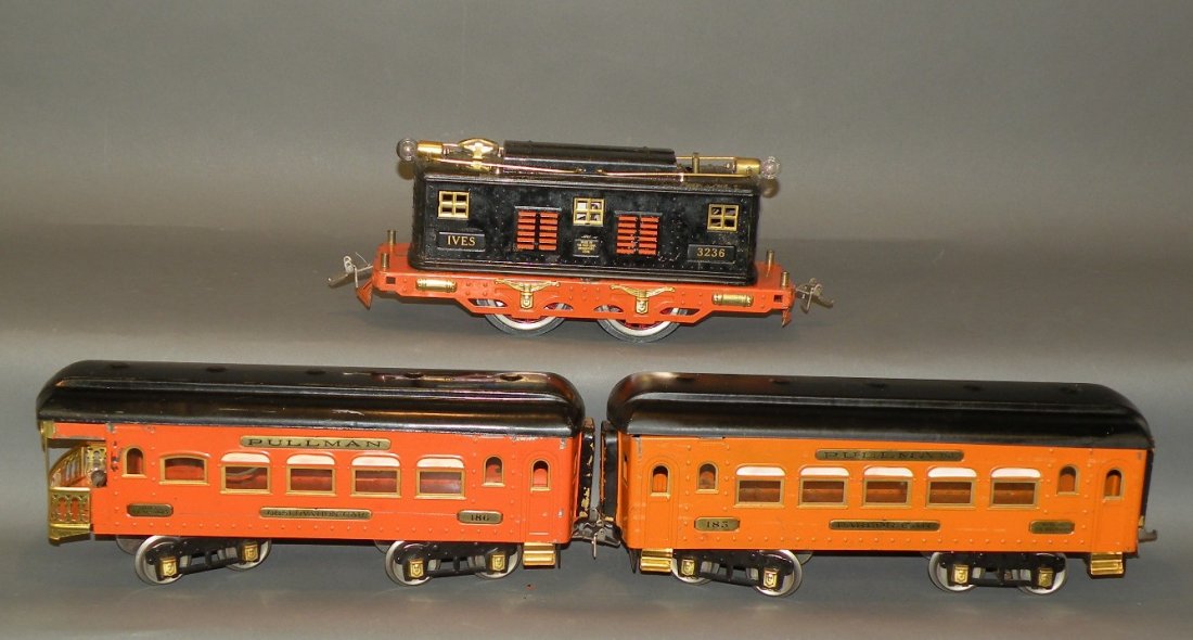 Ives standard gauge train set: ca. 1930; passenger set complete with track, transformer, engine, and two cars with boxes and set box;