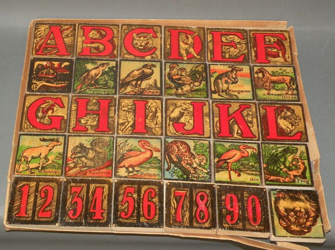 ABC picture block set: ca. 1900; very colorful paper litho ABC’s and animals on wooden blocks with box bottom, 2 ½” square;