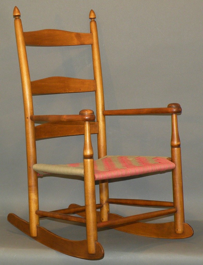 Child’s ladderback rocker: ca. late 1900s; mixed woods with turned posts, three rung back, basket weave fabric seat and signed “NWC 8” on leg, 13”x 16 ¾”x 23 3/8”;