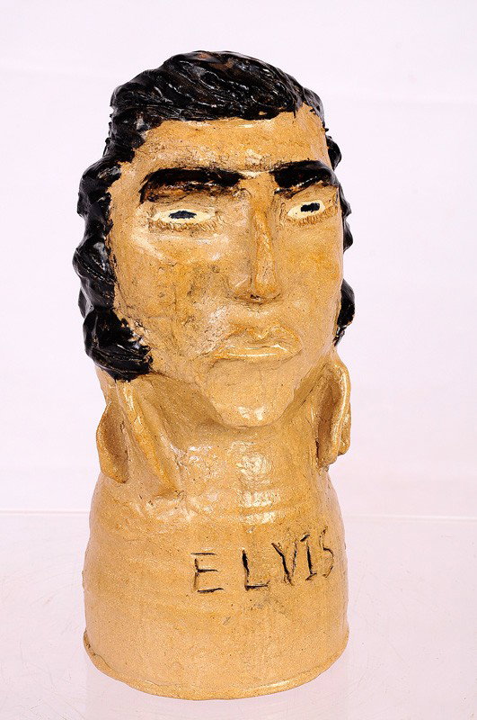 Elvis sculpture by Marie Rogers: hairline in base 9 3/4"