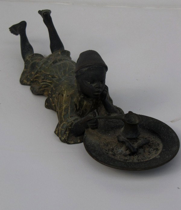 Franz Bergman Austrian cold painted bronze figure : Franz Bergman Austrian cold painted bronze figure of an Arab boy, signed: Geschutzt. H: 2" W: 7 1/2"