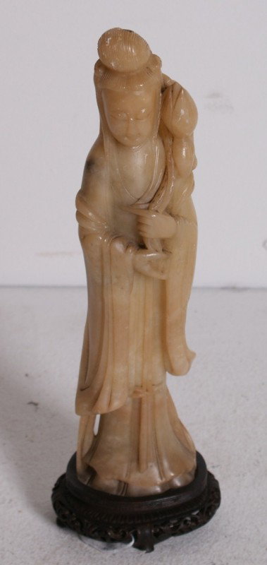 Chinese carved soapstone figure of Quan Yin on a h: Chinese carved soapstone figure of Quan Yin on a hardwood base. H: 13"