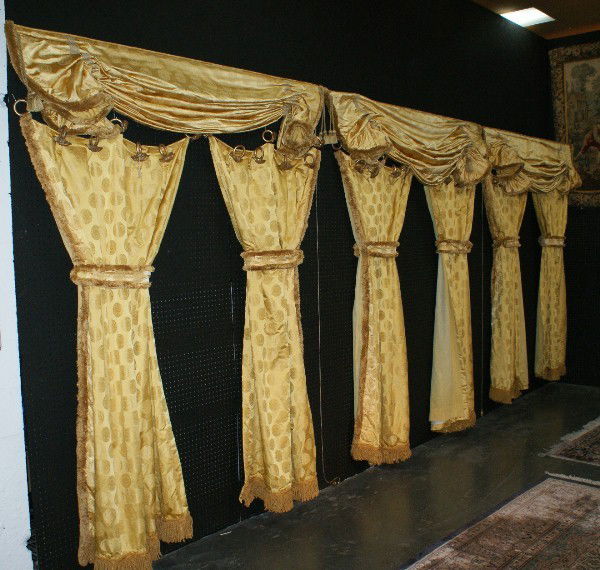 Three sets of Versace window curtains and valances: Three sets of Versace window curtains and valances. Curtain panels: 80" long, Valance: 76" wide.