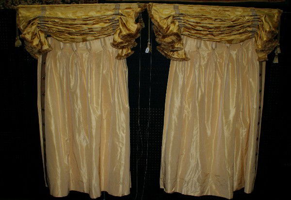 Two sets of Versace window curtains and valances;: Two sets of Versace window curtains and valances; together with Versace king size bed skirt. Curtain panels: 55" long, Valances: 44" wide