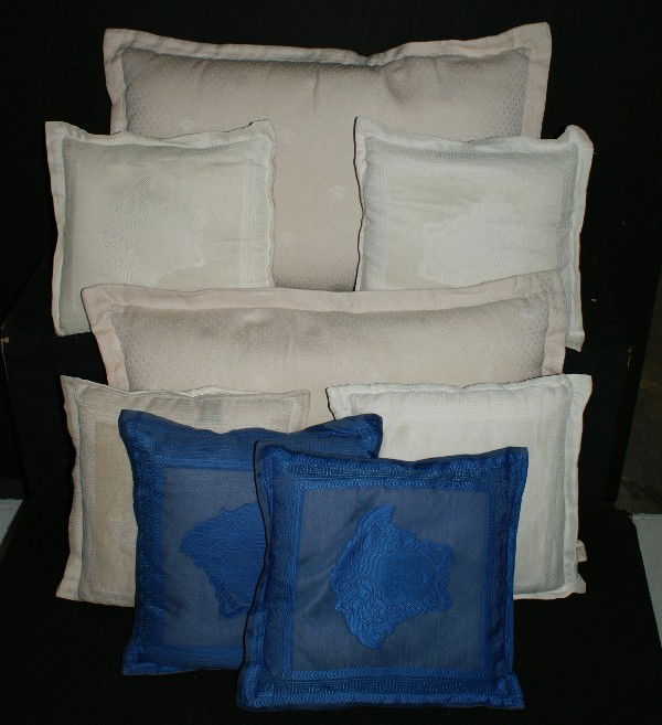 Eight Versace pillows: Eight Versace pillows including two sham pillows and six throw pillows.