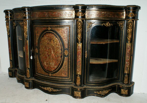 Napoleon III Boulle style credenza, circa 1860. H:: Napoleon III Boulle style credenza, circa 1860. H: 45 1/2" W: 82" D: 19" Note: Some Boulle work restoration needed. Original glass.