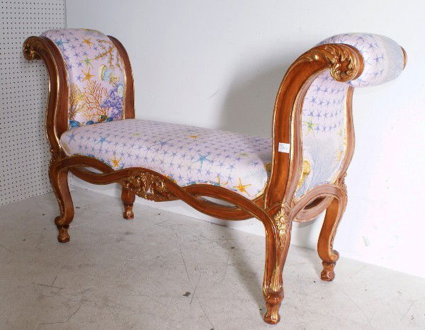 Continental carved and parcel gilt bench with Ate: Continental carved and parcel gilt bench with Atelier Versace upholstery. H: 36" W: 59" D: 18"
