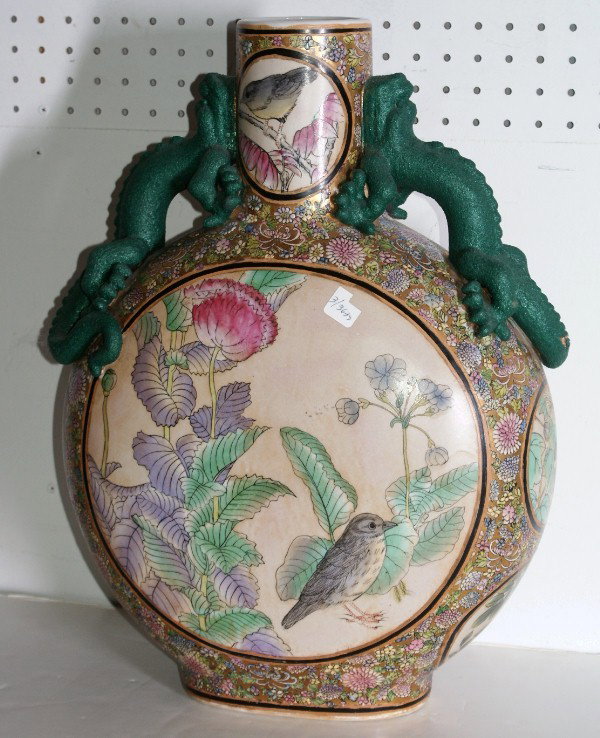 Chinese famille rose porcelain vase: with dragon handles, underside with red chop mark. H: 21" W: 16" over handles.