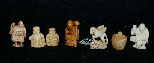 7 Japanese carved ivory netsuke; : (5 signed). Largest: 1 7/8"
