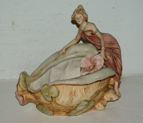 Royal Dux Art Nouveau figural centerpiece with impr: Royal Dux Art Nouveau figural centerpiece with impressed numerals 21 and large raised pink triangle mark "Royal Dux Bohemia". H: 9" W: 10" D: 6 3/4"
