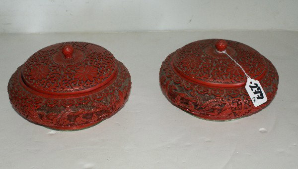 277. Pair of Chinese cinnabar covered boxes: Pair of Chinese cinnabar lacquer and enamel covered boxes. Diameter: 7 3/4"