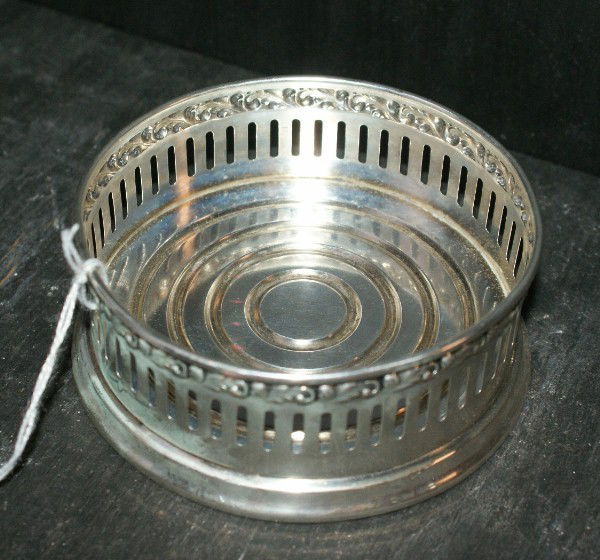 Sterling silver wine coaster.: Sterling silver wine coaster. 1.92 troy ounces