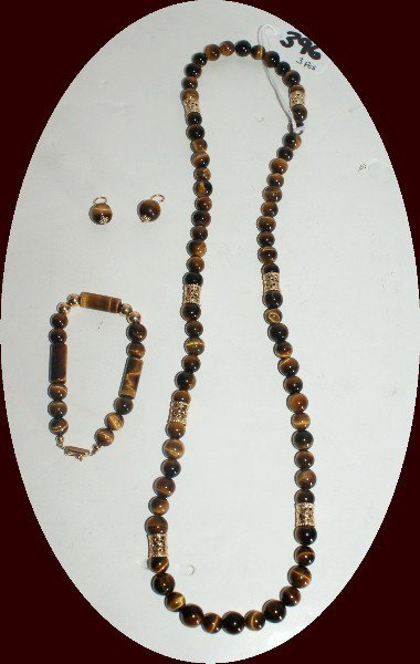 14K yellow gold and cats eye necklace,: bracelet and bobbles.
