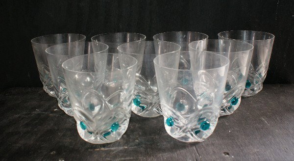 Nine Lalique crystal tumblers. 4 1/2": Nine Lalique crystal tumblers. 4 1/2"