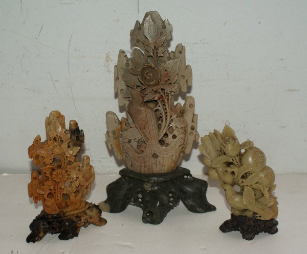 Three Chinese carved soapstone groups.: Tallest: 9 1/4"