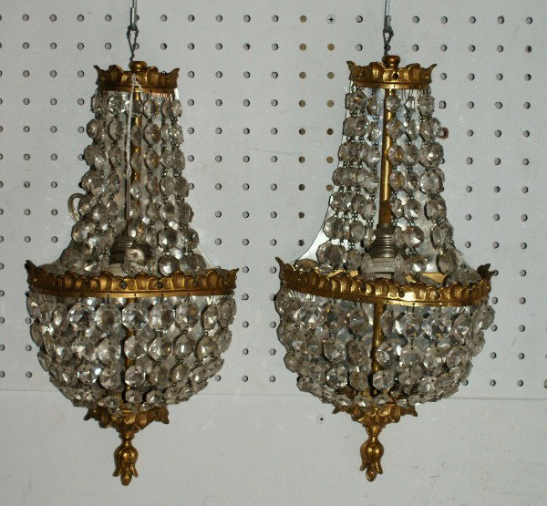 Pair of gilt bronze and beaded crystal sconces: Pair of gilt bronze and beaded crystal sconces. 14 1/2"