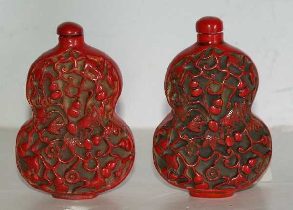 Large pair of carved cinnabar lacquer snuff bottle: 4 1/8"
