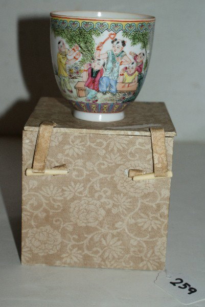 Chinese famille rose egg shell porcelain: cup depicting children in a fitted box, blue six character chop mark. Cup: 3"