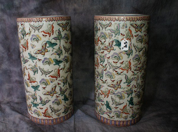 Pair of Chinese rose Canton porcelain umbrella stan: Pair of Chinese rose Canton porcelain umbrella stands decorated with butterflies. 18 1/4"