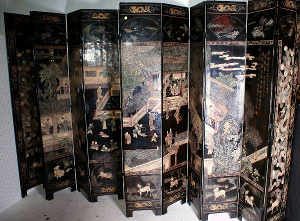 Exceptional 19th C Chinese twelve-fold coromandel l: Exceptional 19th C Chinese twelve-fold coromandel lacquer screen with pavilion, figures, foliage and dragons. H: 9' W: 19' (Note: This lot is being re-offered due to non-payment)