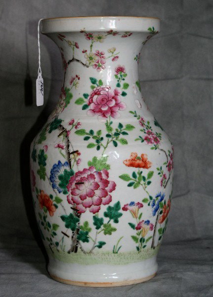 Antique Chinese famille rose porcelain vase with o: Antique Chinese famille rose porcelain vase with old staple repairs. H: 13 3/4"