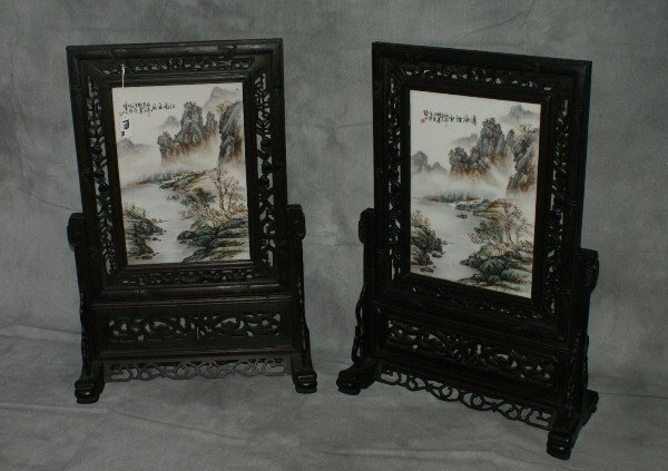 Two Chinese carved hardwood table screens with por: Two Chinese carved hardwood table screens with porcelain plaques. Overall: 27" W: 18" Plaque: 13 3/4" x 9 1/2"