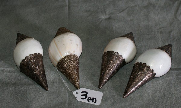 Four porclain and silver shells.: Four porclain and silver shells. L:5"
