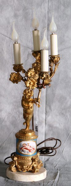 Sevres porcelain and Dore bronze: Sevres porcelain and Dore bronze four light figural candleabra. H:21.5"