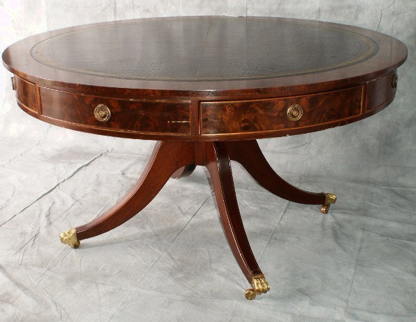 Exceptional English mahogany and tooled leather t: Exceptional English mahogany and tooled leather top game table with four working drawers, on clawed casters. H:31. D:60"