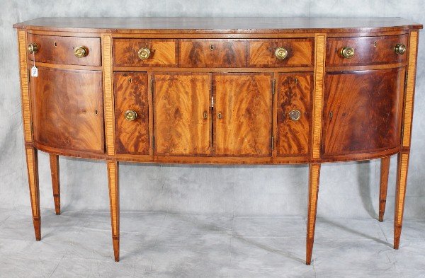 Boston American Hepplewhite Sideboard circa 1790: Period American Hepplewhite Sideboard Boston circa 1790Mahogany with veneer and inlay Hepplewhite sideboard.Four front straight tapered inlaid legs supporting a bowed inlaid apron. The conforming case