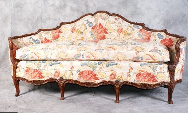 19th C Carved French six leg settee.: 19th C unusual Carved French six leg sette nicely upholstered 77" long.