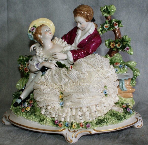 Dresden figural group of romantic couple.: Dresden figural group of romantic couple. H:7.75" L:9"