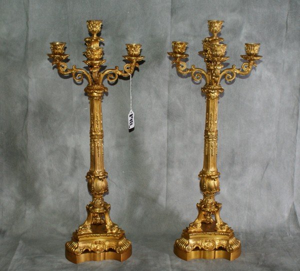 Pair 19th C dore bronze five light candleabraswit: Pair 19th C dore bronze five light candleabraswith dolphins resting on bronze base. H:22. 5".