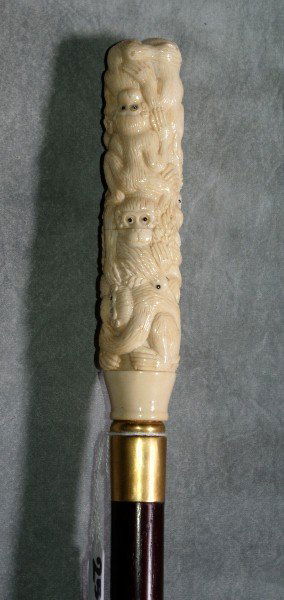 Marine ivory figural walking stick of monkeys. L: Marine ivory figural walking stick of monkeys. L:36".
