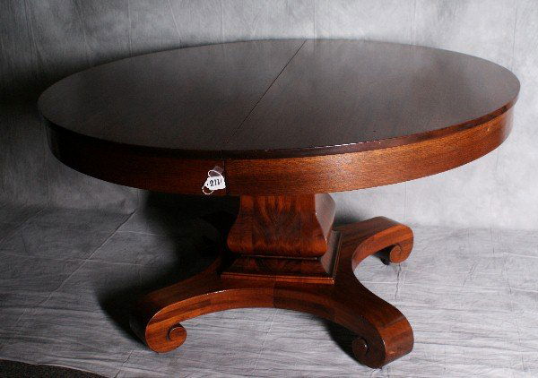 19th C round Mahogany dining table with 4 leaves .: 19th C round Mahogany dining table with 4 leaves . H:29" Diameter closed is 54" and the lenth completey open is 96" W:54"