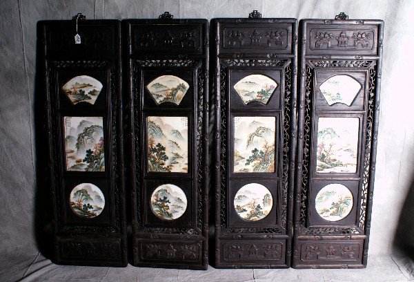 4 Chinese antique hardwood carved frames with por: 4 Chinese antique hardwood carved frames with porcelain plaques. H:48" W:15" this item is being reoffered due to non payment from last auction.