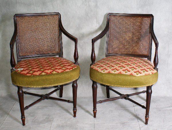 Pair 19th C cain back arm chairs. H:34" W:22" D:20": Pair 19th C cain back arm chairs. H:34" W:22" D:20"