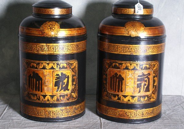Pair of Tole chinese decorated covered canisters.: Pair of Tole chinese decorated covered canisters. H:18"