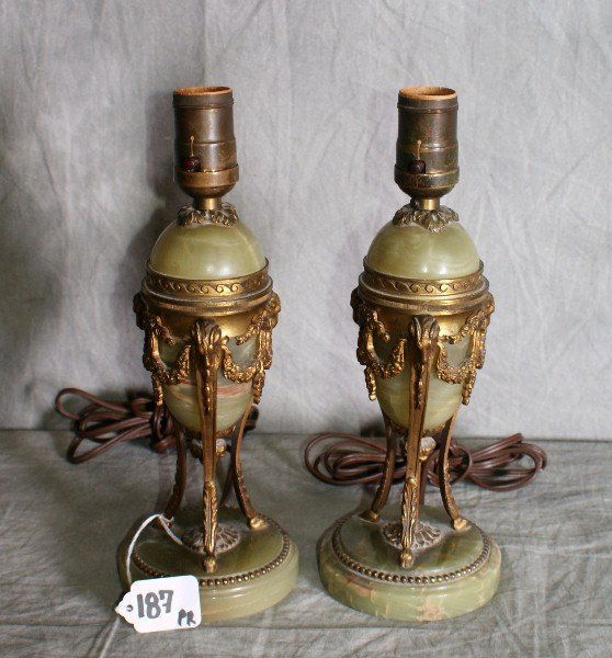 Pair of 19th C bronze and alabaster table lamps wi: Pair of 19th C bronze and alabaster table lamps with bronze garland and rams head decorations. H:11"