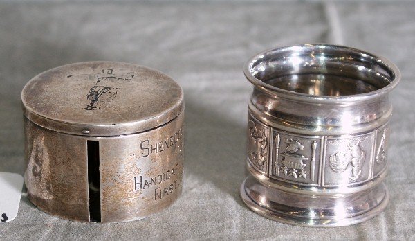 Silver plate stamp box and Sterling silver napkin: Silver plate stamp box and Sterling silver napkin holder. Sterling napkin holder weighs 1.5oz