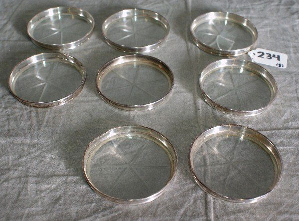 8 Sterling silver and glass coasters.: 8 Sterling silver and glass coasters. D:3.25"
