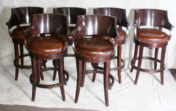 SIX mahogany bar stools.: SIX mahogany bar stools. H:40.5" W:23" D:19"