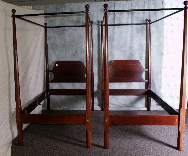 Pair of mahogany poster beds with canopy tops.: Pair of mahogany poster beds with canopy tops. H:79" W:43" L:80"