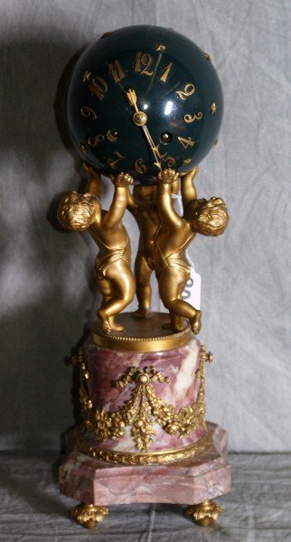 19th C dore bronze and marble figural putti atlas: 19th C dore bronze and marble figural putti atlas clock signed on the back of works and foundry marked. H:16"