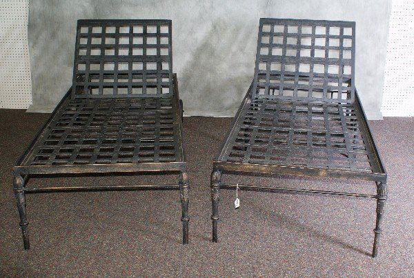 Pair of iron chaise lounges.: Pair of iron chaise lounges. H:16" L:78" W:30"