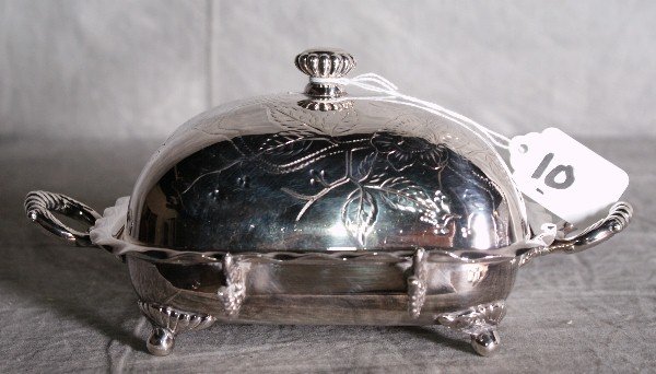 American silver plate dome covered butter dish rai: American silver plate dome covered butter dish raised on ball shaped feet by Pairpoint MFG CO. H: 4.5" L:9" .