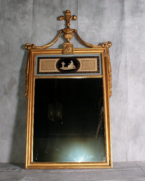 Antique wood trumeau mirror with reverse painted g: Antique wood trumeau mirror with reverse painted glass panel on top. H:47" W:26" .