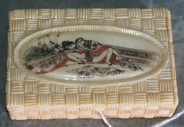 Chinese marine ivory erotic painted pill box. L:3: Chinese marine ivory erotic painted pill box. L:3.75" .