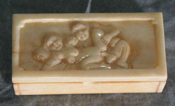 Chinese marine ivory carved erotic pill box. L:2.: Chinese marine ivory carved erotic pill box. L:2.5" .