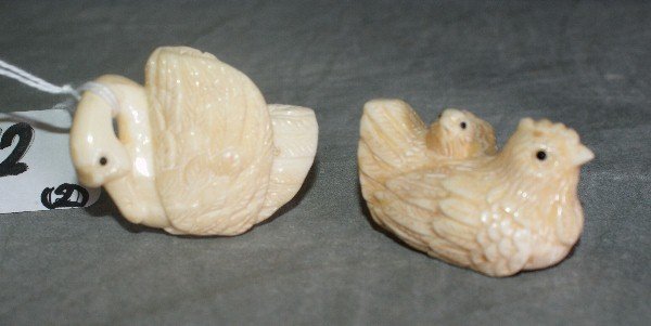 Two marine ivory netsukes of birds. L:2" : Two marine ivory netsukes of birds. L:2"